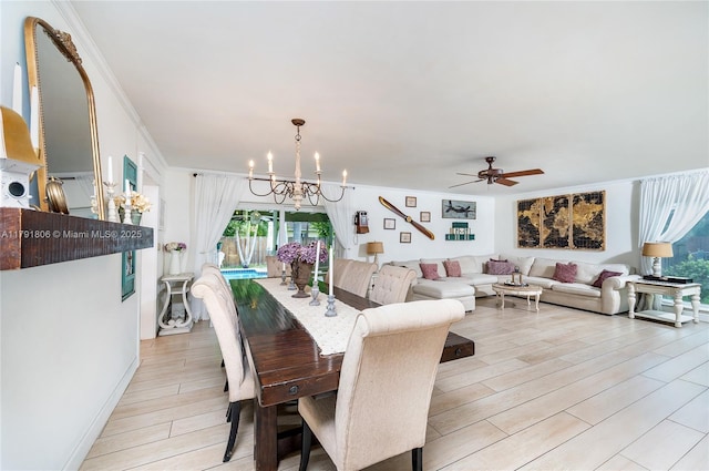 18525 SW 90th Ct, Cutler Bay, FL 33157 - dining room featuring light wood-type flooring, ornamental molding, and ceiling fan with notable chandelier