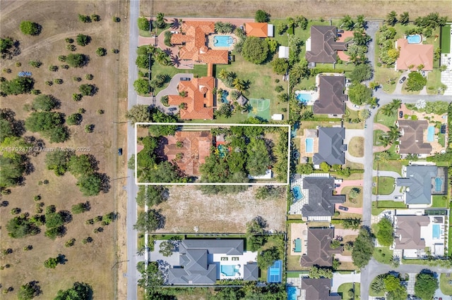 drone / aerial view featuring a residential view