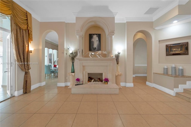 7761 SW 122nd Ave, Miami, FL 33183 - living room with crown molding, arched walkways, light tile patterned floors, baseboards, and a fireplace with raised hearth