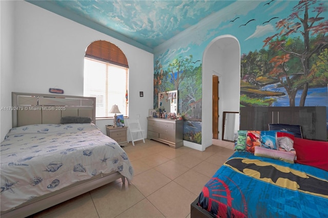 7761 SW 122nd Ave, Miami, FL 33183 - tiled bedroom featuring arched walkways, crown molding, and baseboards