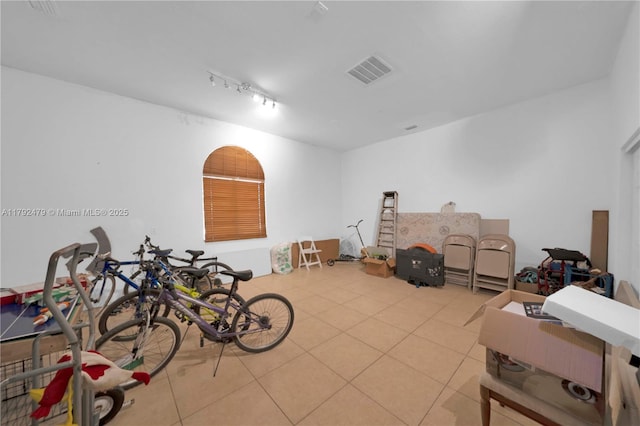 7761 SW 122nd Ave, Miami, FL 33183 - misc room featuring light tile patterned flooring and rail lighting