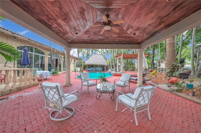 7761 SW 122nd Ave, Miami, FL 33183 - view of patio featuring a gazebo, ceiling fan, and an outdoor pool