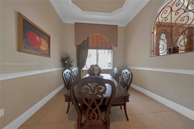7761 SW 122nd Ave, Miami, FL 33183 - dining space with a raised ceiling, tile patterned floors, and baseboards