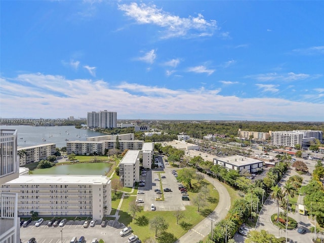 aerial view featuring a water view and a city view