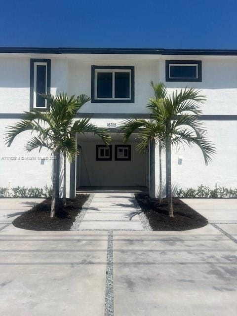 view of front of house with stucco siding