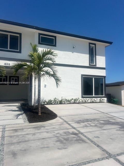 exterior space with stucco siding
