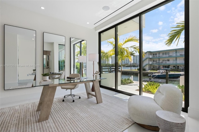 4008 NE 167th St Unit 6, North Miami Beach, FL 33160 - office area with carpet floors and a water view