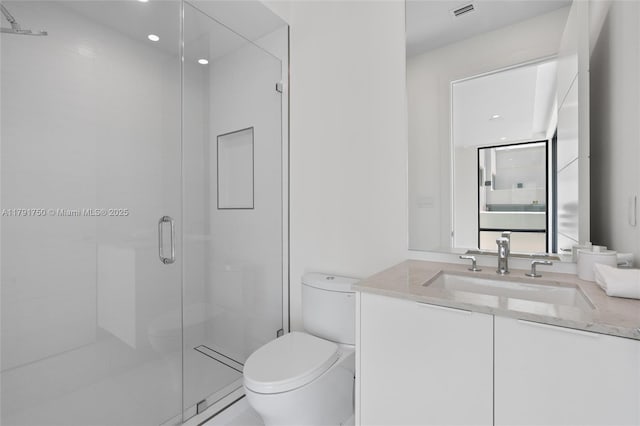 4008 NE 167th St Unit 6, North Miami Beach, FL 33160 - bathroom featuring vanity, toilet, recessed lighting, visible vents, and a stall shower