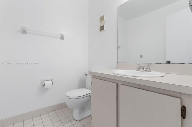 bathroom with vanity, tile patterned floors, visible vents, and toilet