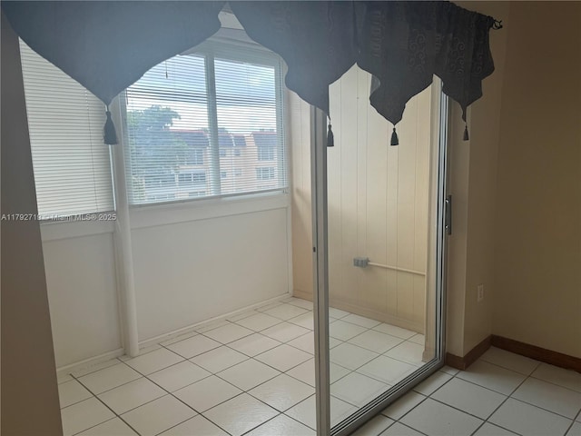 2900 N Pine Island Rd Unit 307, Sunrise, FL 33322 - bathroom with tile patterned floors, a shower stall, and baseboards