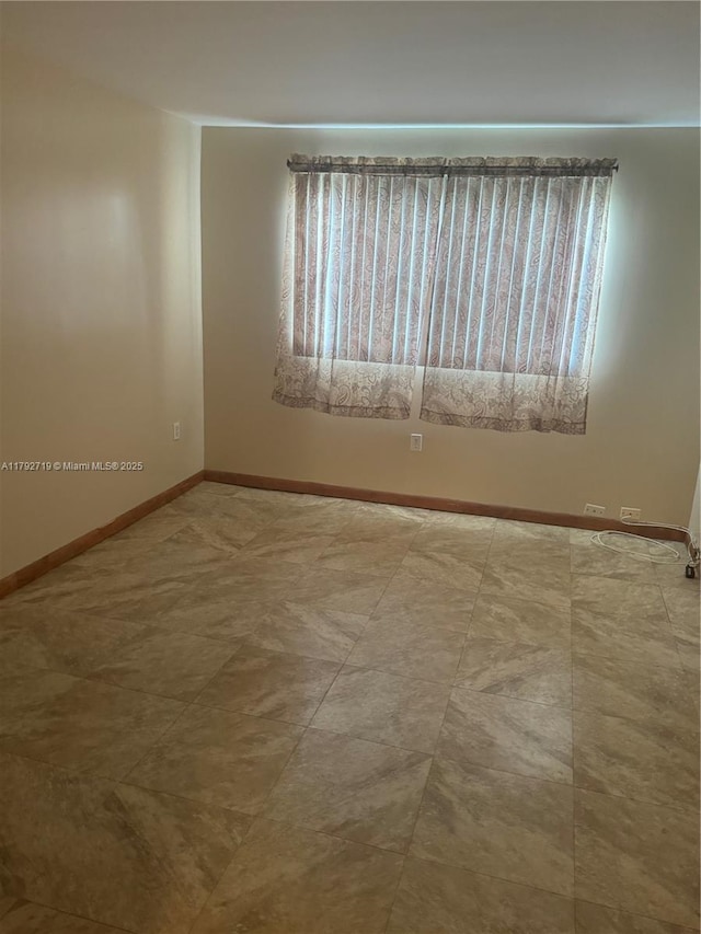 2900 N Pine Island Rd Unit 307, Sunrise, FL 33322 - spare room with baseboards