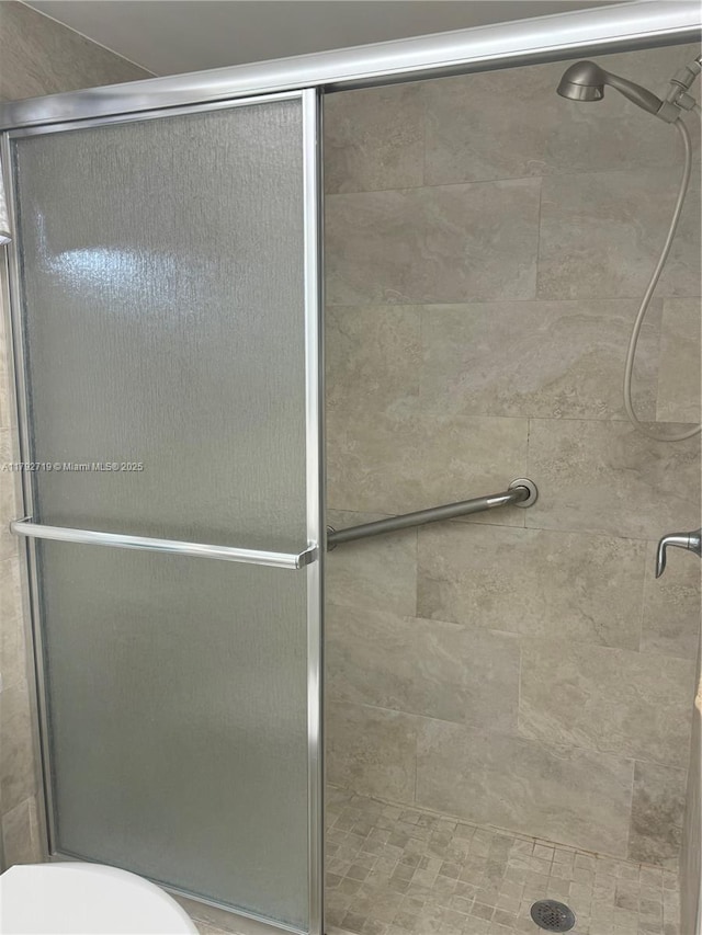 2900 N Pine Island Rd Unit 307, Sunrise, FL 33322 - bathroom featuring a stall shower and toilet