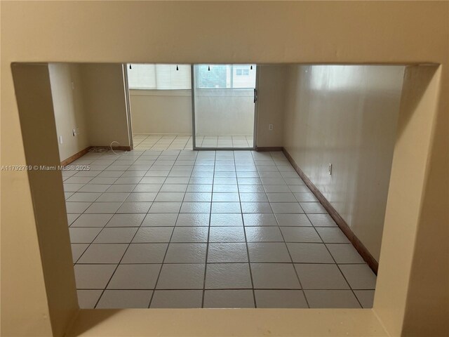 2900 N Pine Island Rd Unit 307, Sunrise, FL 33322 - empty room with baseboards and light tile patterned floors