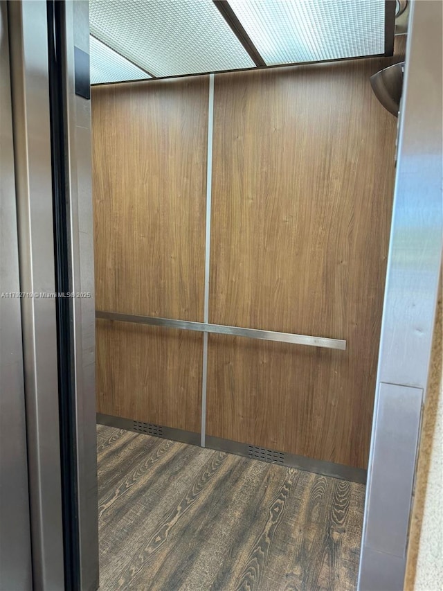 2900 N Pine Island Rd Unit 307, Sunrise, FL 33322 - room details with wood finished floors and elevator