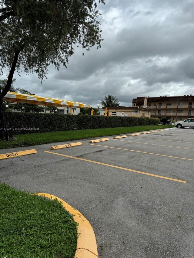 2900 N Pine Island Rd Unit 307, Sunrise, FL 33322 - view of uncovered parking lot
