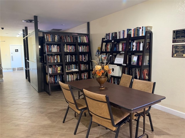 2900 N Pine Island Rd Unit 307, Sunrise, FL 33322 - dining room featuring baseboards