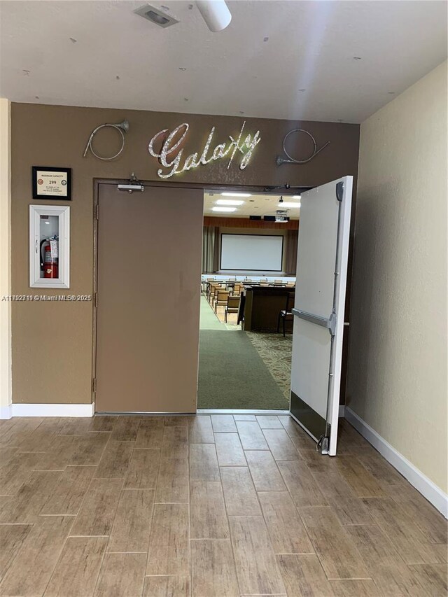2900 N Pine Island Rd Unit 307, Sunrise, FL 33322 - spare room with wood finished floors and visible vents