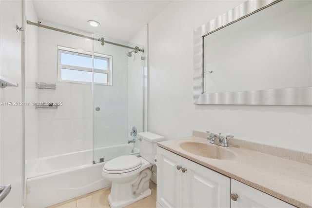 full bathroom with vanity, shower / tub combination, tile patterned floors, and toilet