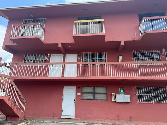 2291 W 53rd Pl Unit 2291, Hialeah, FL 33016 - view of building exterior with stairs