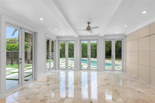 unfurnished sunroom with french doors