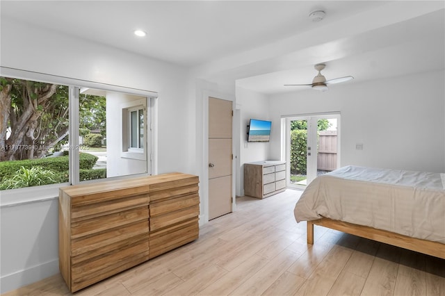 bedroom with light wood-type flooring, a ceiling fan, recessed lighting, and access to exterior