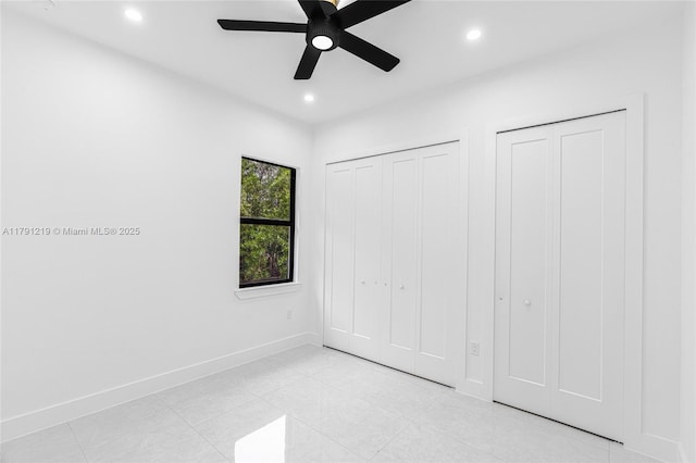 unfurnished bedroom featuring recessed lighting, a ceiling fan, baseboards, and light tile patterned floors