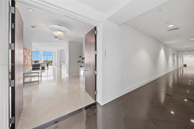 201 Aqua Ave Unit 1001, Miami Beach, FL 33141 - hall featuring baseboards and recessed lighting