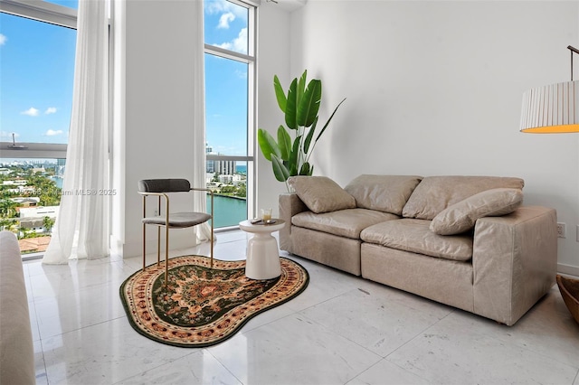 living area featuring a water view