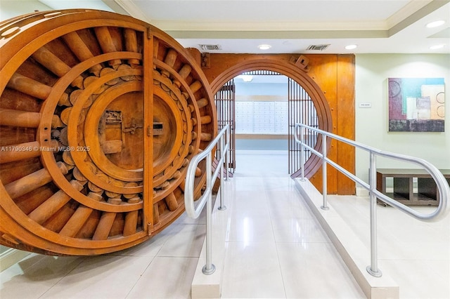 interior space with light tile patterned floors, ornamental molding, recessed lighting, and visible vents