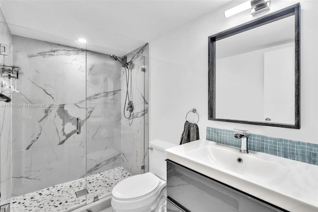 1000 Parkview Dr Unit 329, Hallandale Beach, FL 33009 - full bathroom with a marble finish shower, backsplash, vanity, and toilet