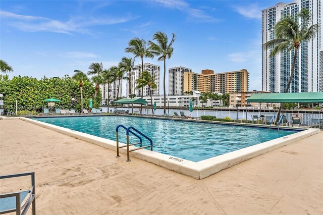 1000 Parkview Dr Unit 329, Hallandale Beach, FL 33009 - pool with fence and a patio