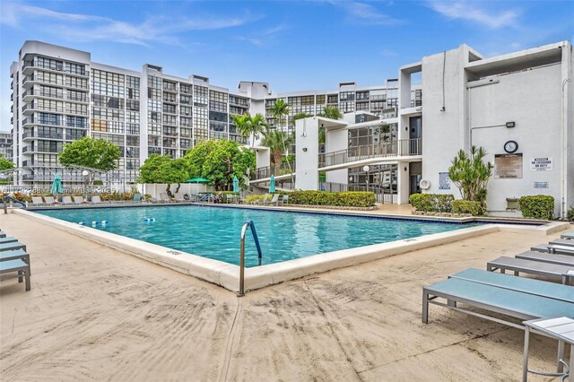 1000 Parkview Dr Unit 329, Hallandale Beach, FL 33009 - community pool featuring fence and a patio