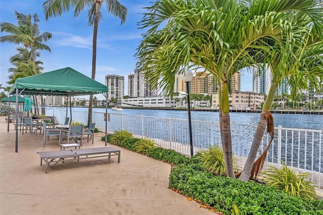 1000 Parkview Dr Unit 329, Hallandale Beach, FL 33009 - surrounding community with a water view and fence