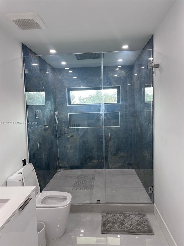 6711 SW 127th Pl, Miami, FL 33183 - bathroom with visible vents, marble finish floor, a stall shower, and toilet