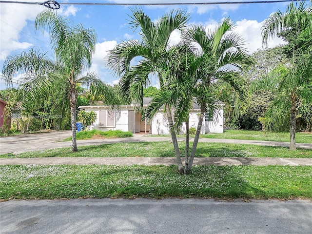 5709 Mckinley St, Hollywood, FL 33021 - view of front of property with driveway and a front lawn