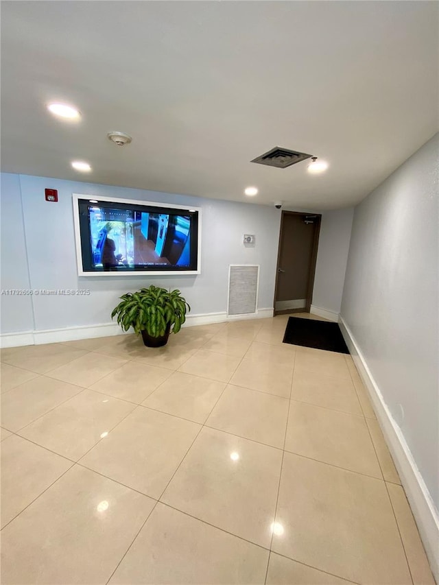 1700 NW N River Dr Unit 501, Miami, FL 33125 - hall with baseboards, tile patterned flooring, recessed lighting, and visible vents
