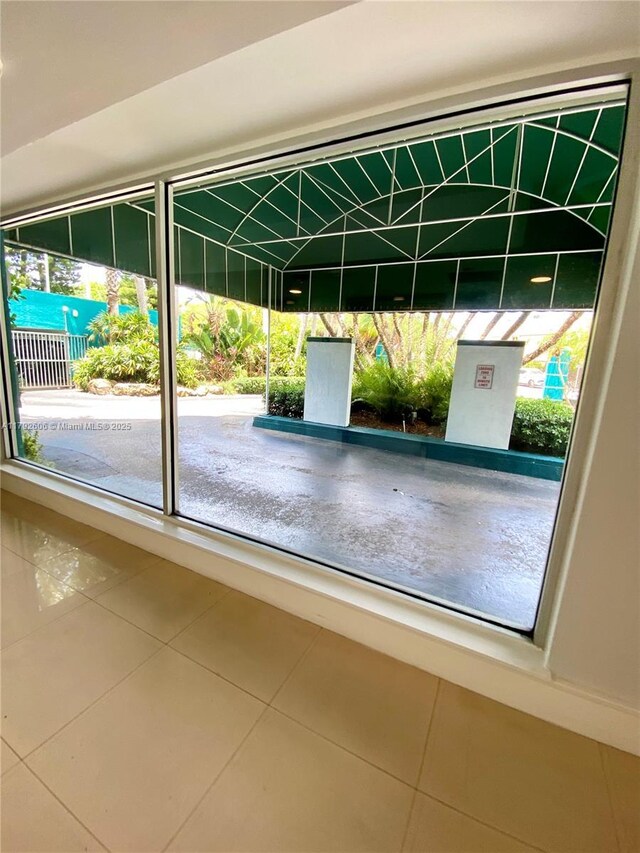 1700 NW N River Dr Unit 501, Miami, FL 33125 - doorway featuring tile patterned floors and plenty of natural light