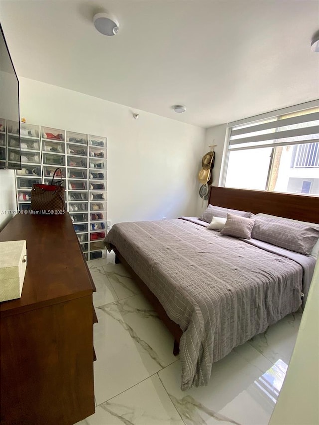 1700 NW N River Dr Unit 501, Miami, FL 33125 - bedroom with marble finish floor