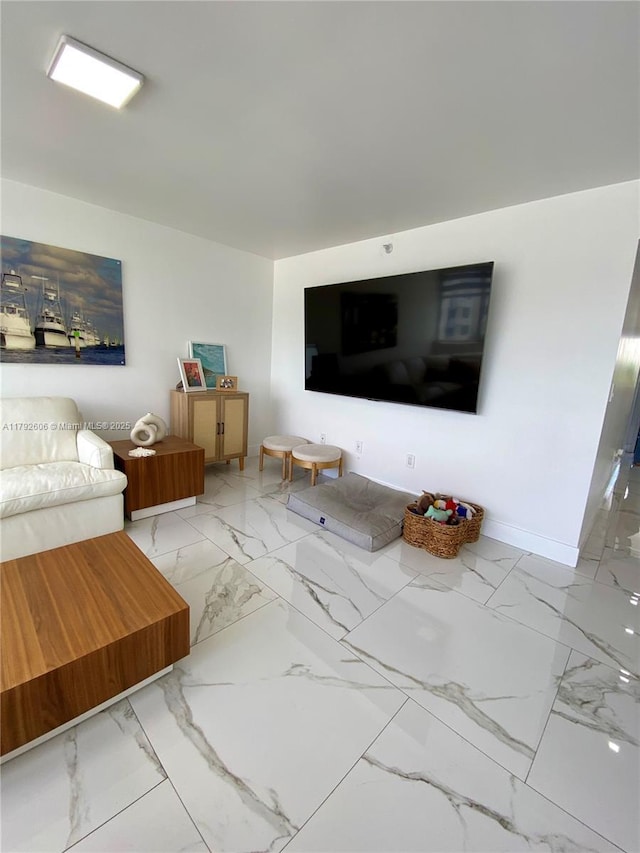 1700 NW N River Dr Unit 501, Miami, FL 33125 - living area featuring baseboards and marble finish floor