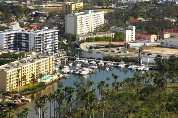 1700 NW N River Dr Unit 501, Miami, FL 33125 - aerial view featuring a city view and a water view