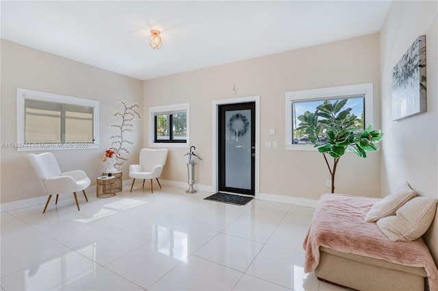 6470 SW 33rd St, Miami, FL 33155 - living area with light tile patterned flooring and baseboards