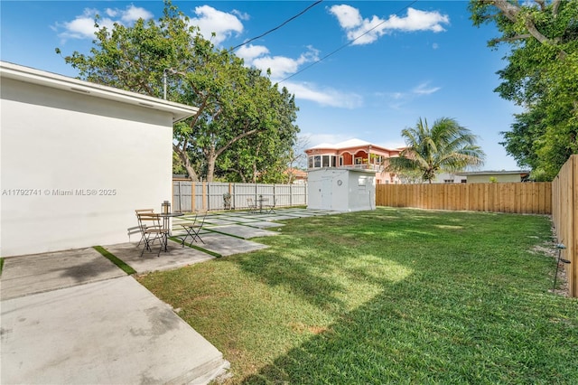 6470 SW 33rd St, Miami, FL 33155 - view of yard featuring a shed, an outdoor structure, and a patio
