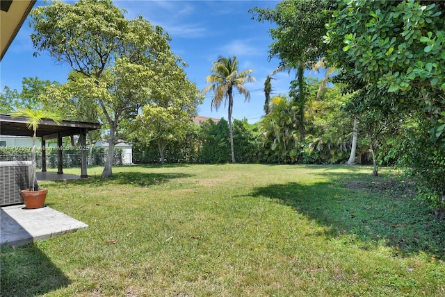4515 SW 83rd Ave, Miami, FL 33155 - view of yard with central air condition unit, fence, and a patio area