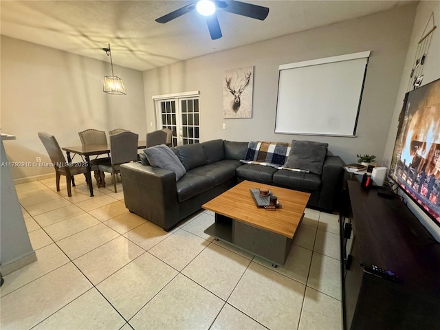 7514 NW 177th Ter Unit 7514, Hialeah, FL 33015 - living area with baseboards, ceiling fan, french doors, and light tile patterned floors