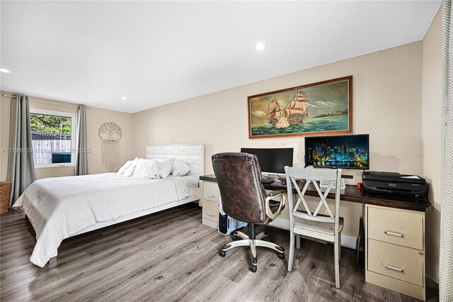 1595 NE 174th St, North Miami Beach, FL 33162 - bedroom with wood finished floors, an office area, and recessed lighting