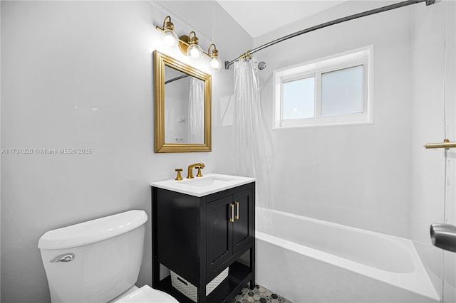 bathroom featuring vanity, toilet, and shower / bath combo with shower curtain