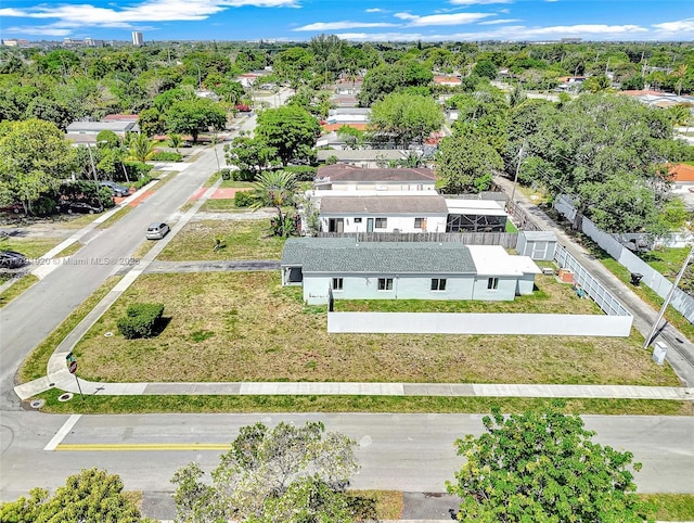 1595 NE 174th St, North Miami Beach, FL 33162 - aerial view of property and surrounding area with a tree filled landscape