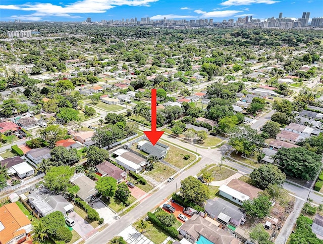 birds eye view of property featuring a view of city