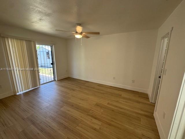 13333 SW 112th Pl, Miami, FL 33176 - unfurnished room with baseboards, ceiling fan, and wood finished floors