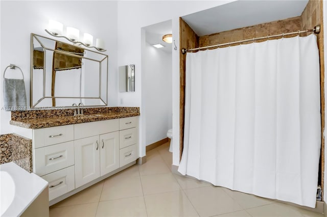 bathroom featuring vanity, tile patterned floors, a bathing tub, toilet, and a shower with shower curtain